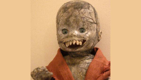 страшная кукла с зубами