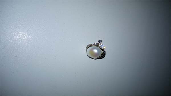 Сережка с жемчужиной