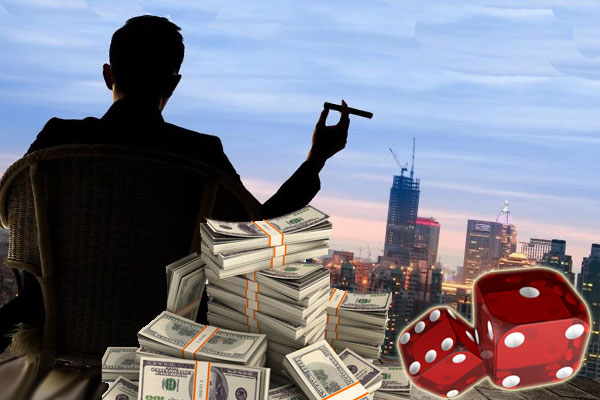 силуэт мужчины и деньги на фоне небоскрёбов